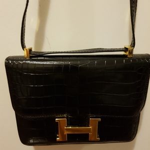 Croc leather sling bag